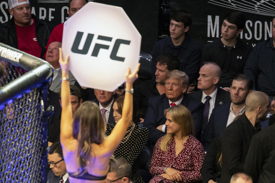 President Donald Trump looks on during UFC 244 mixed martial arts fights, Saturday, Nov. 2, 2019, in New York. (AP Photo/ Evan Vucci)