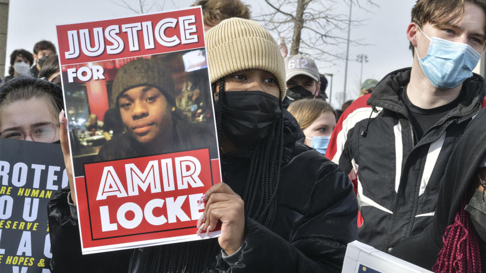 Protesters at Central High School in St. Paul demand justice for Amir Locke