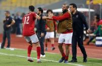 Soccer Football - CAF Champions League - Semi-Final - Al Ahly vs Etoile du Sahel - Borg El Arab Stadium, Borg El Arab, Egypt - October 22, 2017 Al Ahly's Walid Azaro celebrates with Emad Moteab and coach Hossam El-Badry after scoring a goal REUTERS/Amr Dalsh