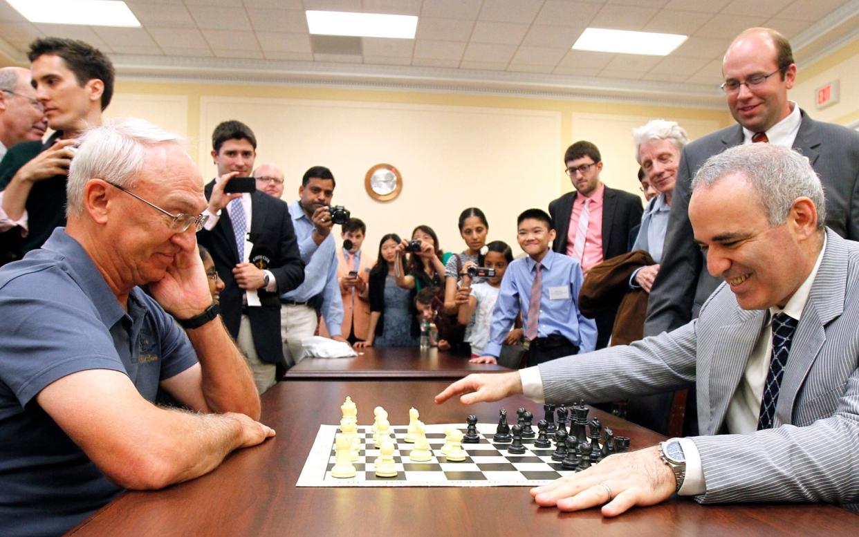 Garry Kasparov, right, and Rex Sinquefield, founder and president of the board of directors of the St Louis Chess Club - Invision