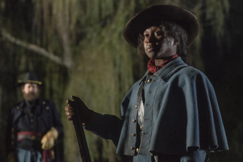 This image released by Focus Features shows Cynthia Erivo as Harriet Tubman in a scene from "Harriet." (Glen Wilson/Focus Features via AP)