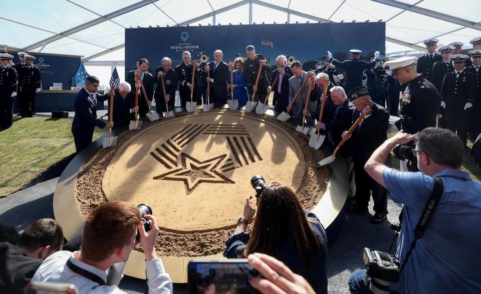 Medal of Honor recipients and officials, including President George W. Bush, break ground for the National Medal of Honor Museum in Arlington on Friday.