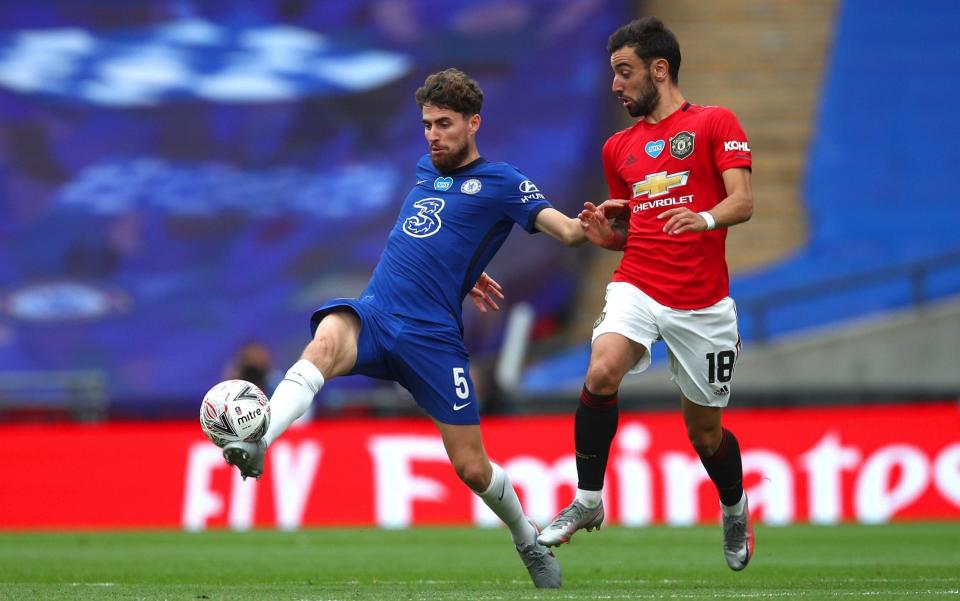 Jorginho (left) battles for possession with Bruno Fernandes - GETTY IMAGES