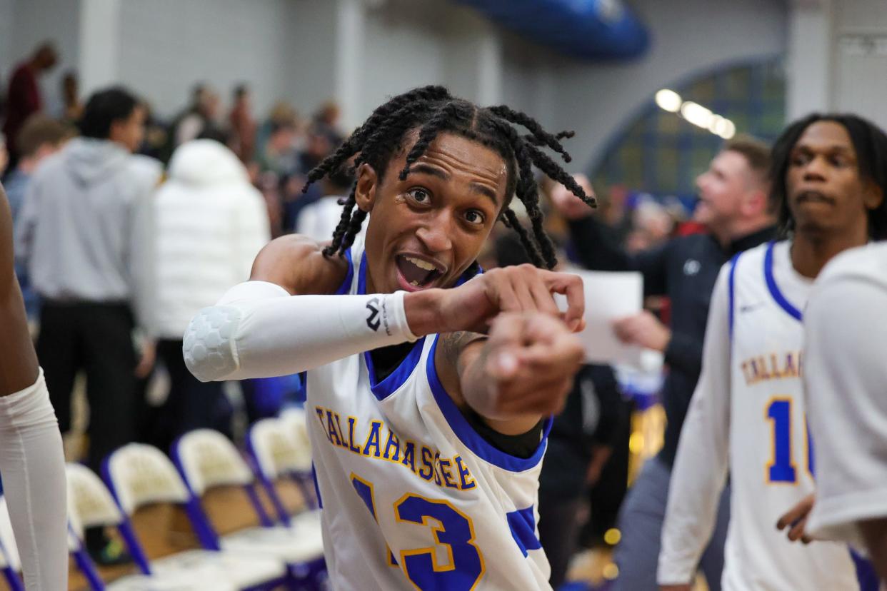 Tallahassee Community College men’s basketball guard Malachi Davis (13) celebrates a win at the Bill Hebrock Eagledome in Tallahassee, Florida