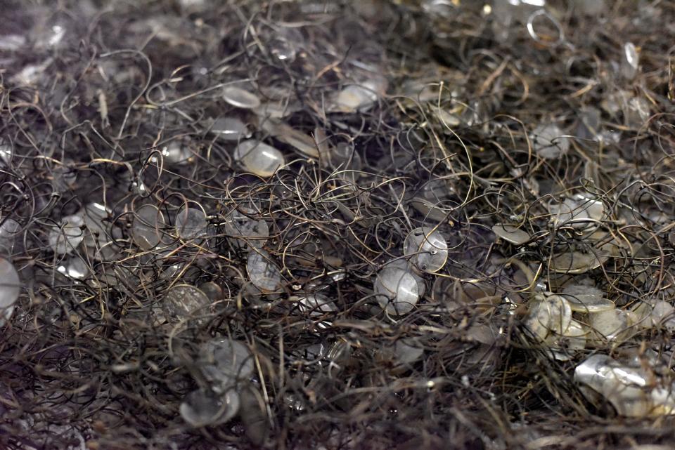 remains of glasses that belonged to people who were murdered (REUTERS:Pawel Ulatowski).JPG