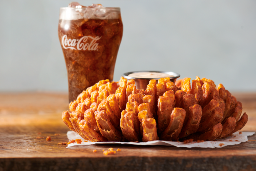 The Veterans Day at Outback Steakhouse will be a free Bloomin' Onion and beverage with purchase of an adult entree.
