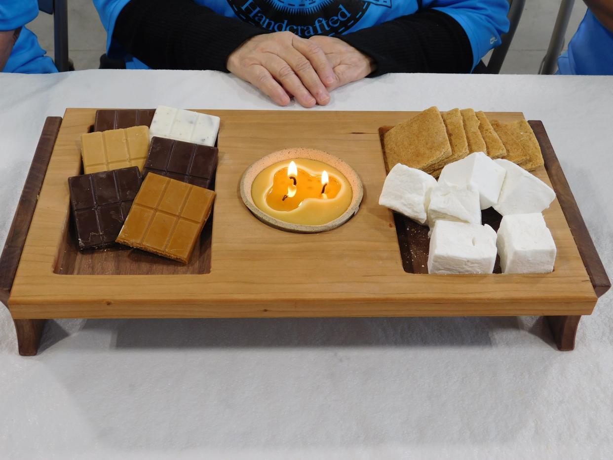 Everything on this S'mores board is a local product from the fresh-made marshmallows and graham crackers to the beeswax candle inside a  small, handmade crock.