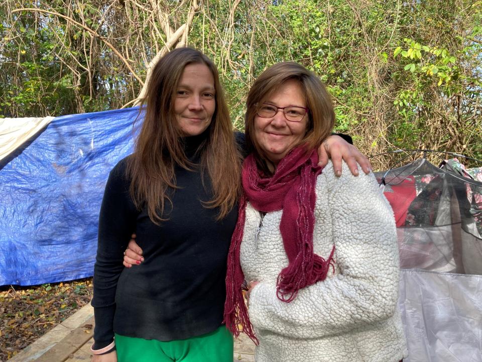 Amanda Whitley, left, and Whitney Brooks lived in a homeless encampment in Gastonia.