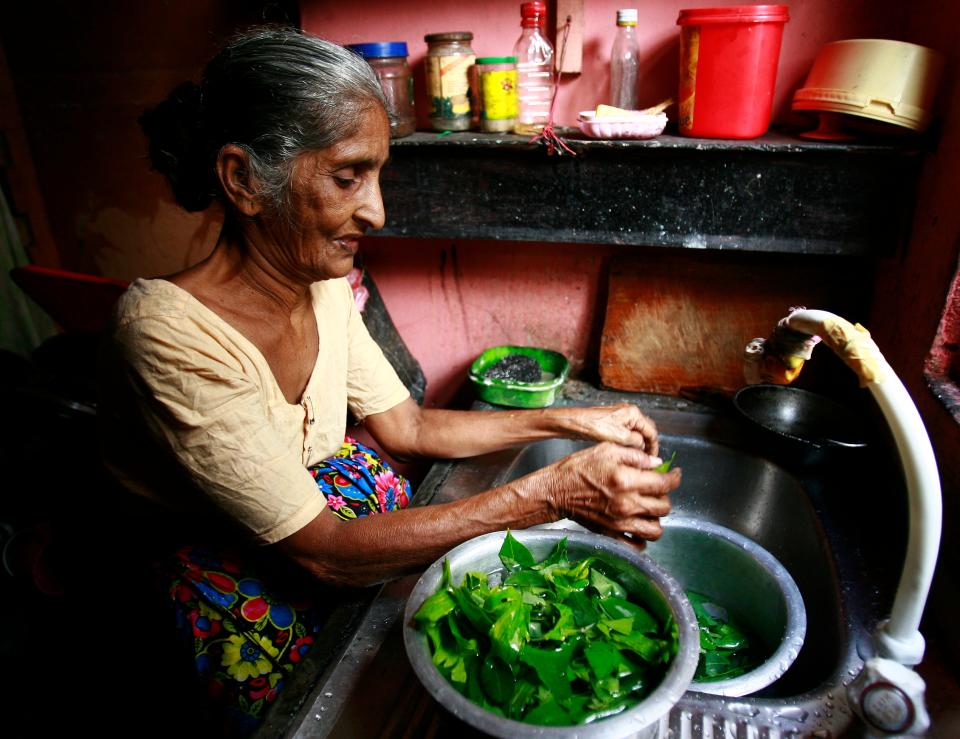 eating healthy cooking kitchen old woman