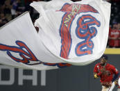 Atlanta Braves' Ronald Acuna Jr. celebrates at the end of a baseball game against the St. Louis Cardinals, Friday, June 18, 2021, in Atlanta. (AP Photo/Ben Margot)