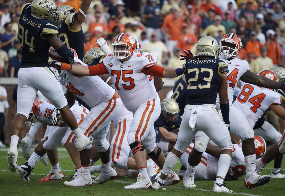 FILE - In this Sept. 22, 2018, file photo, Clemson offensive tackle Mitch Hyatt (75) works against Georgia Tech during the first half of a game in Atlanta. Hyatt was named to the 2018 AP All-America NCAA college football team, Monday, Dec. 10, 2018. (AP Photo/Jon Barash, mFile)