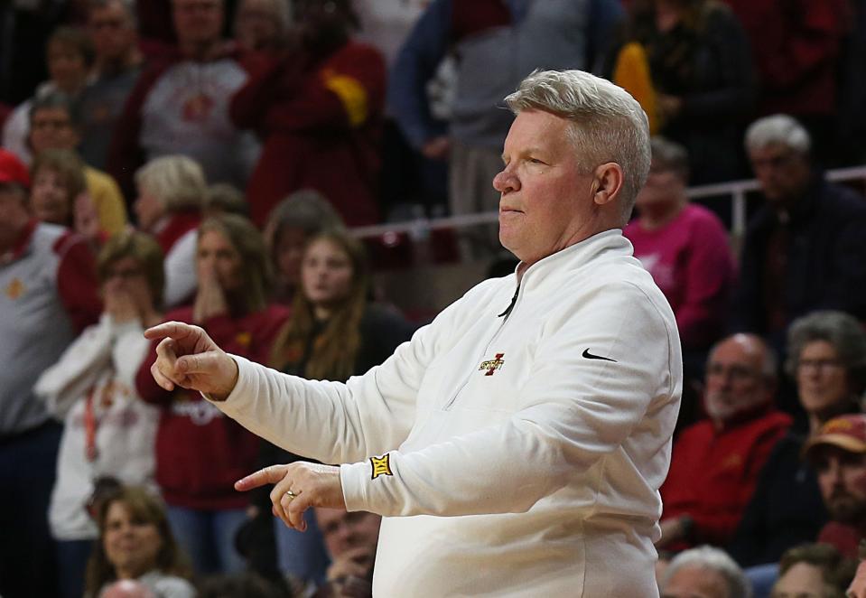 Iowa State Cyclones women's basketball head coach Bill Fennelly shows sign to players during the first overtime against Kansas State Wildcats of a NCAA women's basketball at Hilton Coliseum on Feb.14, 2024, in Ames, Iowa.
