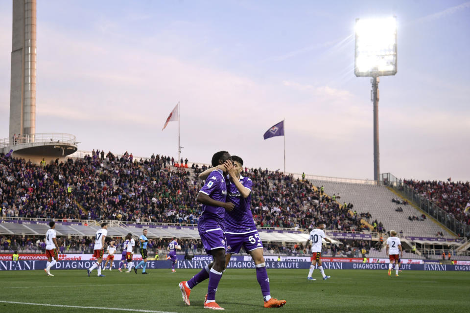 Fiorentina's Jonathan Ikone celebrates scoring his side's opening goal during the Serie A soccer match between Fiorentina and Genoa, at the Artemio Franchi Stadium in Florence, Italy, Monday April 15, 2024. (Massimo Paolone/LaPresse via AP)