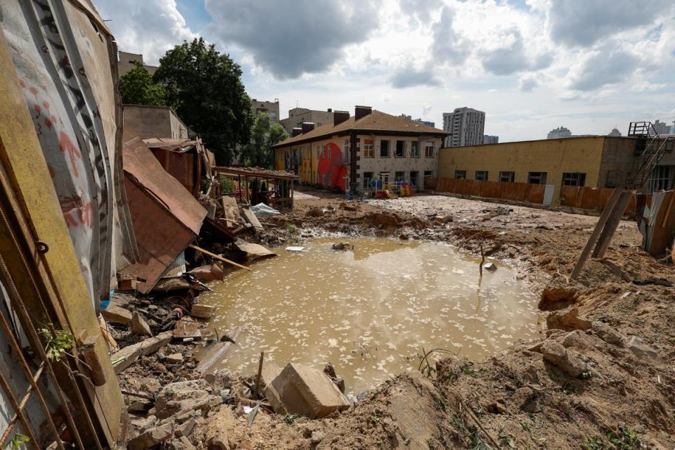 A crater is seen at a compound of a kindergarten after a Russian missile strike (REUTERS)