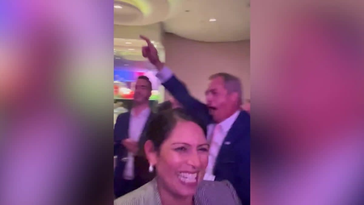 Priti Patel dances with Nigel Farage at Conservative Party conference. (Emily Hewertson)