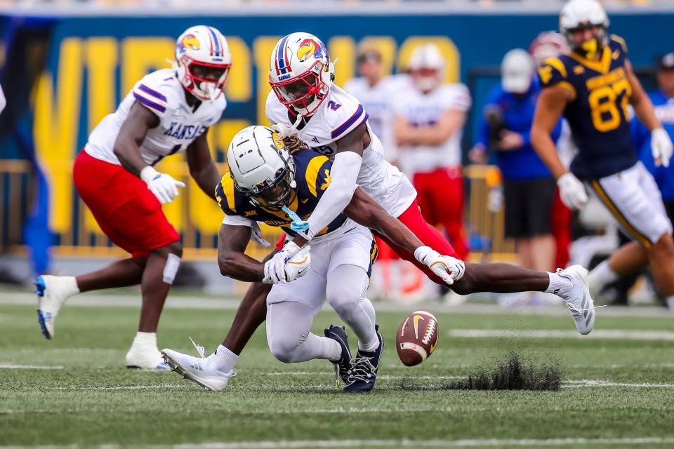 Kansas football cornerback Cobee Bryant (2) breaks up a pass during a Sept. 21, 2024 game against West Virginia in Morgantown, West Virginia.