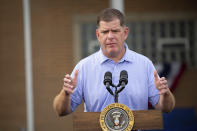 FILE - Secretary of Labor Marty Walsh speaks before President Joe Biden at a United Steel Workers of America Labor Day event in West Mifflin, Pa., just outside Pittsburgh, Sept. 5, 2022. The Biden administration is saying the U.S. economy would face a severe economic shock if senators don't pass legislation this week to avert a rail worker strike. Walsh and Transportation Secretary Pete Buttigieg are meeting with Democratic senators Thursday, Dec. 1, to underscore that rail companies will begin shuttering operations well before a potential strike begins on Dec. 9. (AP Photo/Rebecca Droke, File)