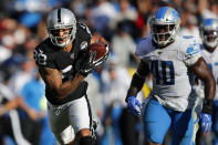 Oakland Raiders wide receiver Marcell Ateman (88) runs in front of Detroit Lions middle linebacker Jarrad Davis (40) during the second half of an NFL football game in Oakland, Calif., Sunday, Nov. 3, 2019. (AP Photo/John Hefti)