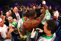 ATLANTIC CITY, NJ - APRIL 28: Chad Dawson celebrates with his corner after he was the declared the winner after a 12 round decision against Bernard Hopkins during their WBC & Ring Magazine Light Heavyweight Title fight at Boardwalk Hall Arena on April 28, 2012 in Atlantic City, New Jersey. (Photo by Al Bello/Getty Images)