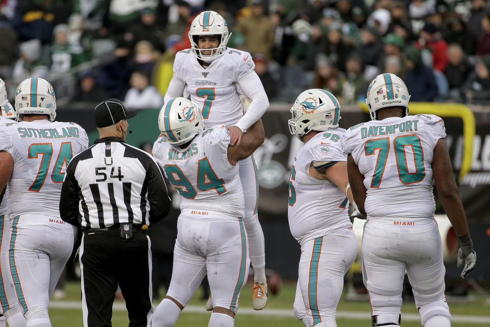 Miami Dolphins kicker Jason Sanders (7) celebrates after kicking a field goal against the New York Jets during the fourth quarter of an NFL football game, Sunday, Dec. 8, 2019, in East Rutherford, N.J. (AP Photo/Seth Wenig)