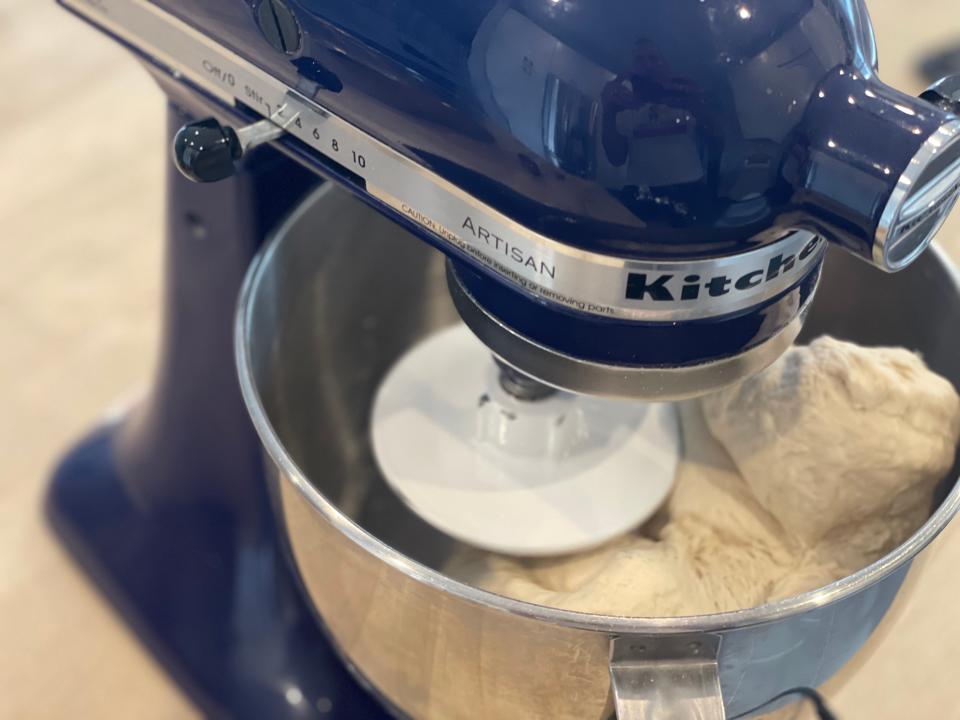 bread dough in a kitchen stand mixer