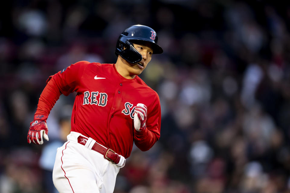 BOSTON, MA - MAY 4: Masataka Yoshida #7 of the Boston Red Sox runs toward first after hitting an RBI single during the fourth inning of a game against the Toronto Blue Jays on May 4, 2023 at Fenway Park in Boston, Massachusetts. (Photo by Billie Weiss/Boston Red Sox/Getty Images)