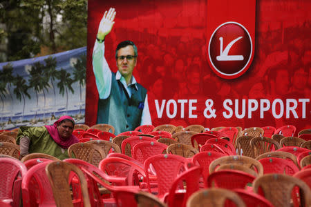 A supporter of Kashmir's National Conference (NC) attends an election campaign rally in Srinagar April 15, 2019. REUTERS/Danish Ismail/Files