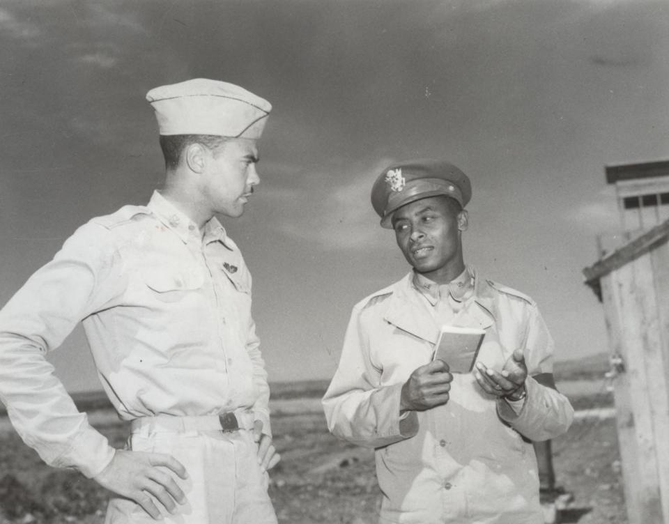 Ollie Stewart, right, with Benjamin O. Davis Jr., United States Air Force (USAF) general, commander of the World War II Tuskegee Airmen, the first African-American brigadier general in the Air Force.