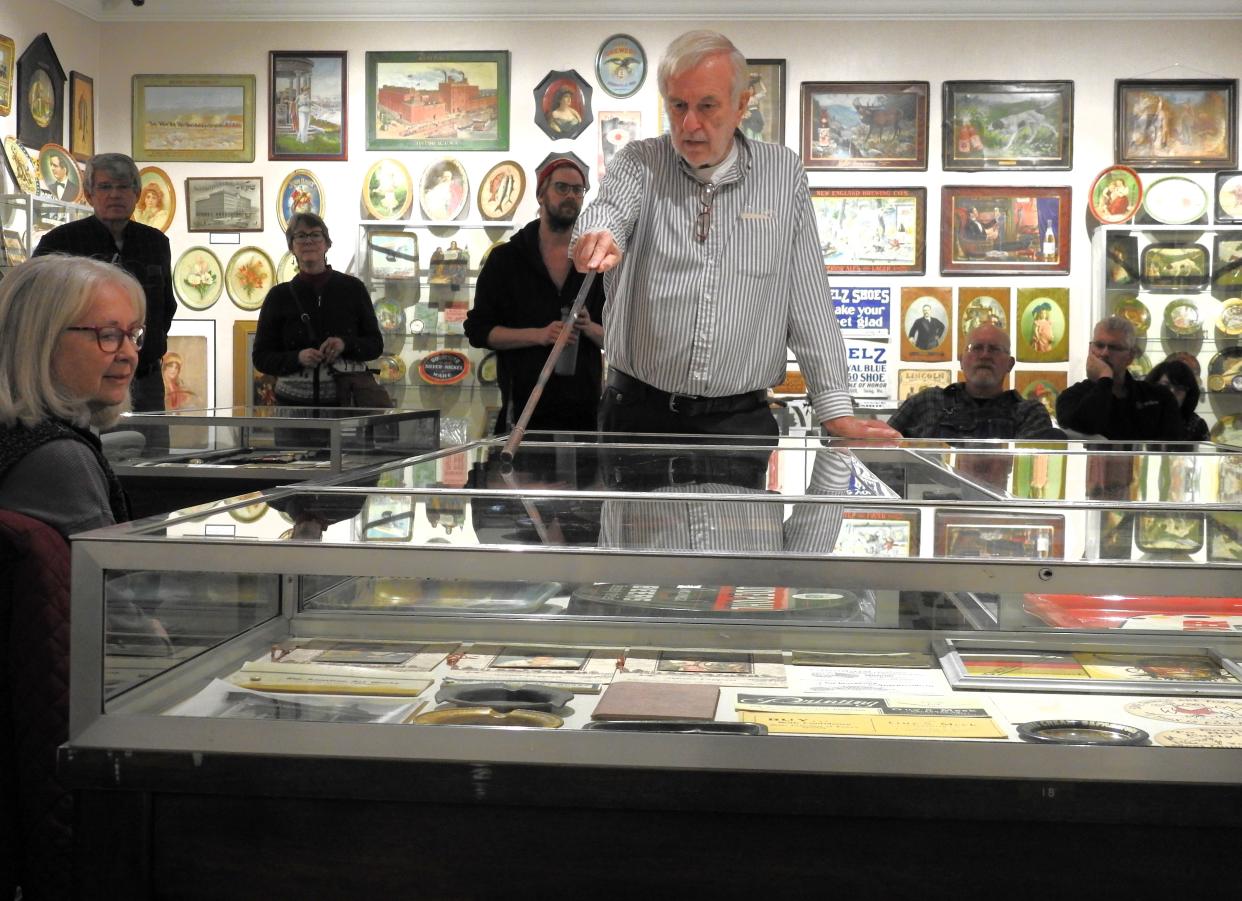 Joe Kreitzer points out items and talks about the history of specialty advertising in Coshocton from its origins in the 1880s when the industry started to die out in the 1950s. The special exhibit is on display through the end of the year at the Johnson Humrickhouse Museum.