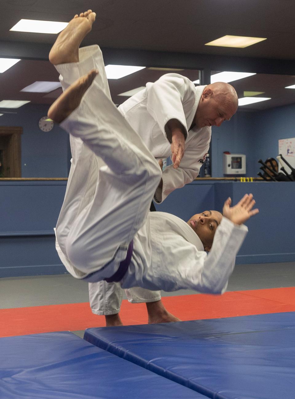 Jason David Tabor demonstrates a hip throw with Chris Albert for a class of 10- to 13-year-olds at Fair Haven Martial Arts in Fair Haven, which provides martial arts and fitness training for its customers. Wednesday, Feb. 1, 2023