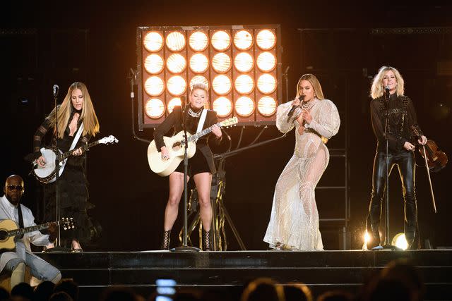 <p>Image Group LA/Disney General Entertainment Content via Getty</p> Beyonce and The Chicks perform at the CMA Awards in Nashville in November 2016