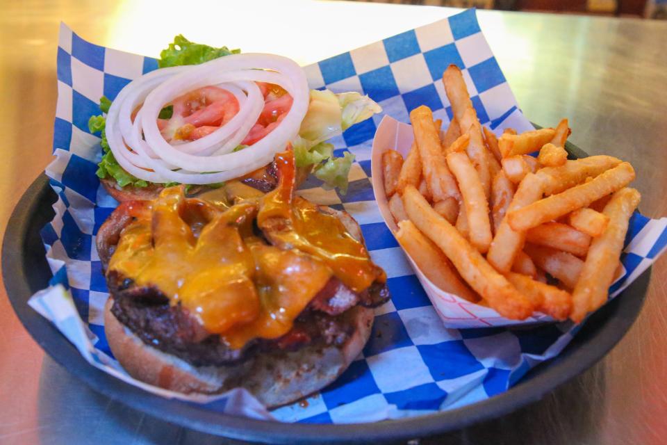 "The Famous" Dr. Padre is Padre Island Burger Company's signature hamburger. It contains cheddar cheese, bacon and made in house Dr. Padre sauce.