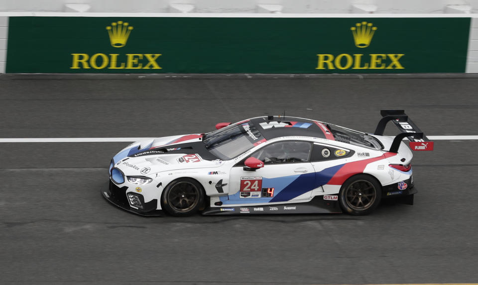 The BMW M8 GTE driven by Alex Zanardi, Jesse Krohn, John Edwards and Chaz Mostert is shown during practice for the IMSA 24 hour race at Daytona International Speedway, Thursday, Jan. 24, 2019, in Daytona Beach, Fla. (AP Photo/John Raoux)