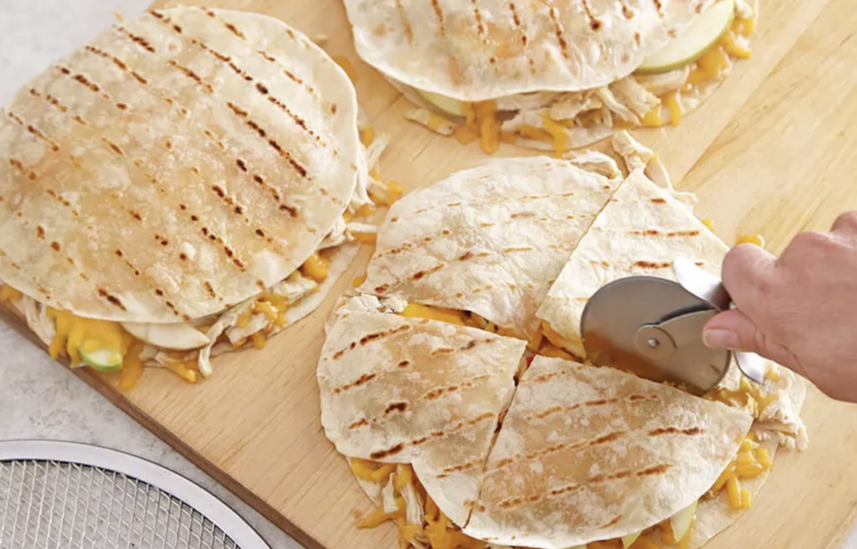 <p>Another fantastic choice to use up leftovers, these quesadillas with shredded chicken, apple butter and Dijon mustard are a mouthwatering spin on this <a href="https://www.thedailymeal.com/eat/mexican-food-history-dishes-invented?referrer=yahoo&category=beauty_food&include_utm=1&utm_medium=referral&utm_source=yahoo&utm_campaign=feed" rel="nofollow noopener" target="_blank" data-ylk="slk:iconic Mexican meal;elm:context_link;itc:0;sec:content-canvas" class="link ">iconic Mexican meal</a>.</p> <p><a href="https://www.thedailymeal.com/recipes/grilled-chicken-quesadillas-apple-and-cheddar-recipe?referrer=yahoo&category=beauty_food&include_utm=1&utm_medium=referral&utm_source=yahoo&utm_campaign=feed" rel="nofollow noopener" target="_blank" data-ylk="slk:For the Grilled Chicken Quesadillas With Apple and Cheddar recipe, click here.;elm:context_link;itc:0;sec:content-canvas" class="link ">For the Grilled Chicken Quesadillas With Apple and Cheddar recipe, click here.</a></p>