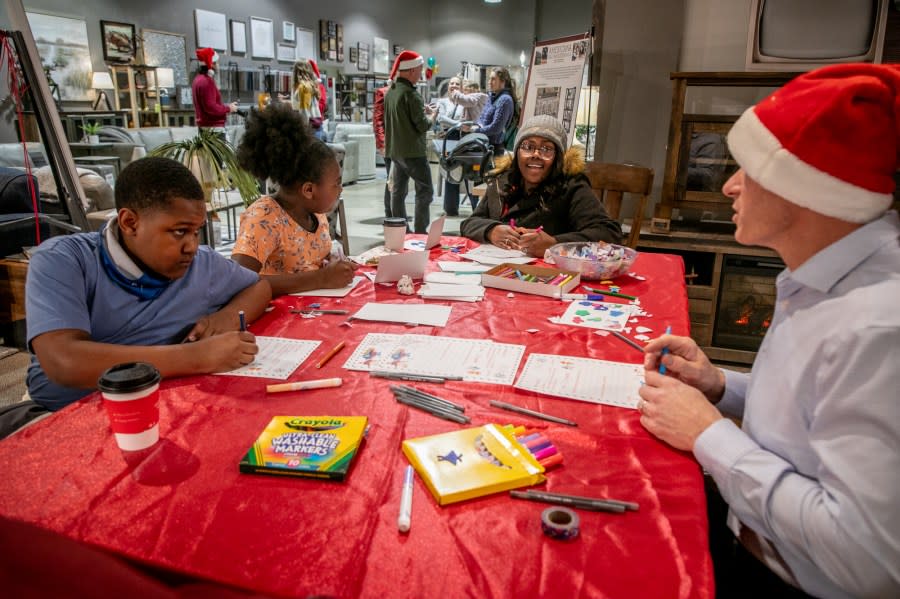 The Angel Tree Christmas Party at Talsma Furniture near Grand Rapids on Nov. 30, 2023. (Michael Buck/WOOD TV8)