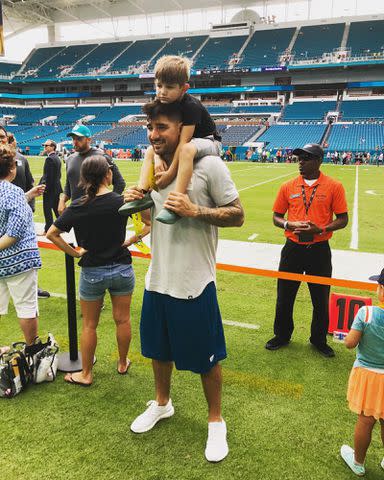 <p>Nick Castellanos Instagram</p> Nick and Liam Castellanos at a Miami Dolphins game in October 2017.