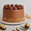 <p>This Ferrero Rocher <a href="https://www.delish.com/uk/cooking/recipes/g31954424/easter-cake-recipes/" rel="nofollow noopener" target="_blank" data-ylk="slk:cake;elm:context_link;itc:0;sec:content-canvas" class="link ">cake</a> is a seriously indulgent bake with a soft, hazelnut spiked sponge coated in a delicious <a href="https://www.delish.com/uk/cooking/recipes/a35582220/nutella-cups-recipe/" rel="nofollow noopener" target="_blank" data-ylk="slk:Nutella;elm:context_link;itc:0;sec:content-canvas" class="link ">Nutella</a> frosting, topped with everyone’s favourite chocolate treats. </p><p>Get the <a href="https://www.delish.com/uk/cooking/recipes/a35901680/fererro-rocher-cake/" rel="nofollow noopener" target="_blank" data-ylk="slk:Fererro Rocher Cake;elm:context_link;itc:0;sec:content-canvas" class="link ">Fererro Rocher Cake</a> recipe.</p>