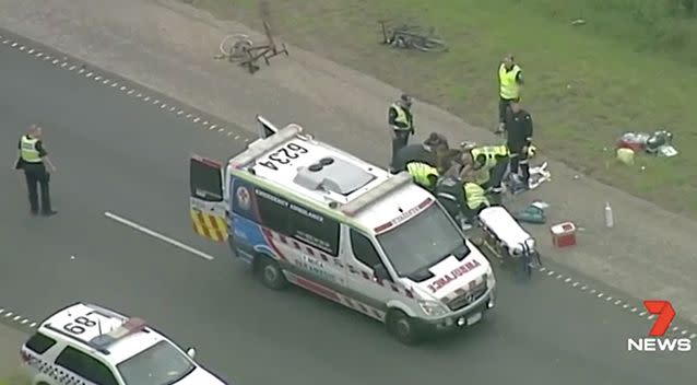 Ambulance officers worked to revive the off-duty police officer for more than an hour. Photo: 7 News