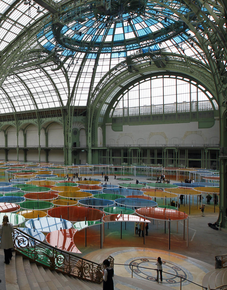 View of the creation of contemporary artist Daniel Buren in the Grand Palais during the opening of ground-breaking Monumenta exhibit in Paris, Wednesday May 9, 2012. Monumenta, the hugely-popular annual installation project that's in its fifth year, dares an artist of international stature to "move into" the nave of one of the French capital's most monumental buildings, and own it. (AP Photo/Francois Mori)