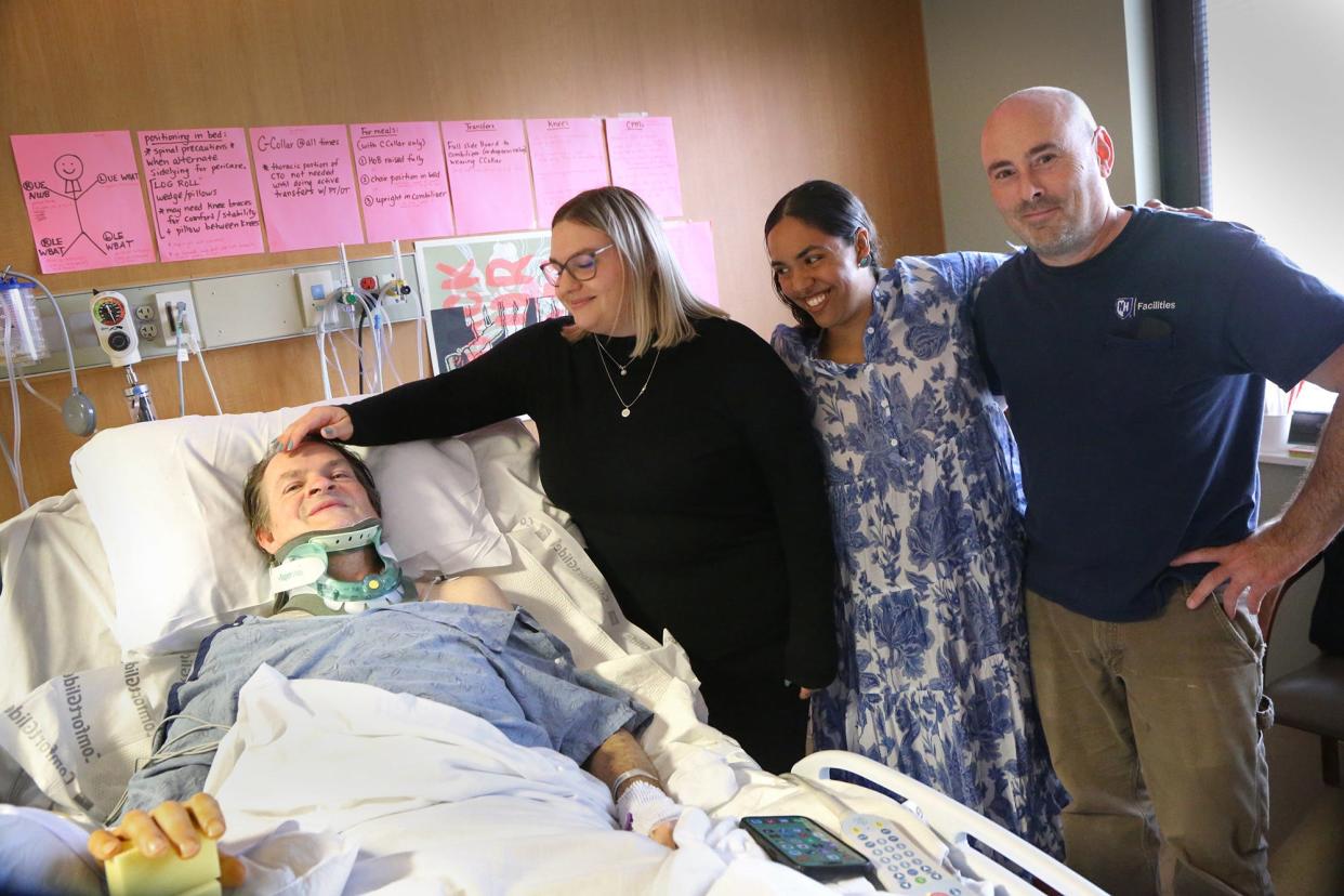 Joel Paul of Stratham, in his bed at Portsmouth Regional Hospital with his daughter, Rachel Paul-Nelson, June Moreau and Rodger Shosa.