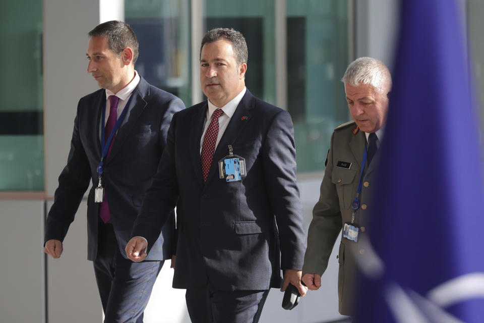 Albania's Defense Minister Niko Peleshi arrives for a meeting of NATO defense ministers at NATO headquarters in Brussels, Wednesday, Oct. 12, 2022. (AP Photo/Olivier Matthys)
