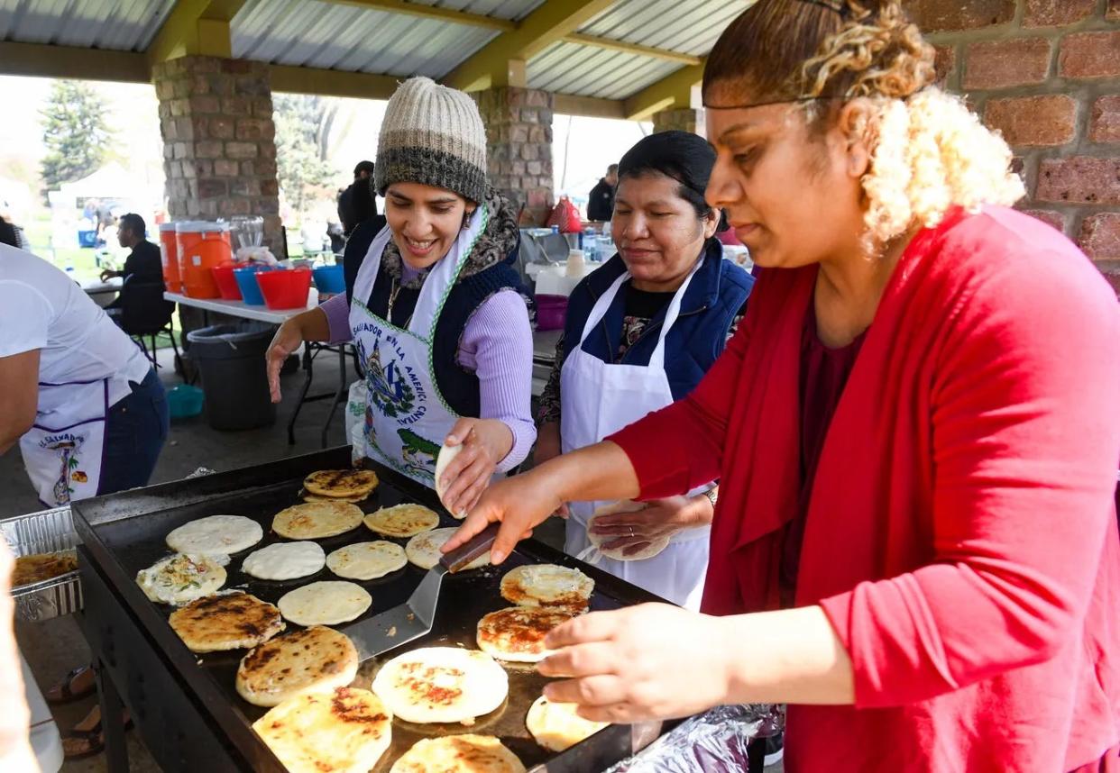 Esmerelda Rivas, Juana Sebastian and Rubia Lopez make pupusas, a traditional El Salvadorian food, at a Cinco De Mayo celebration on Saturday, May 7, 2022, at Falls Park in Sioux Falls.