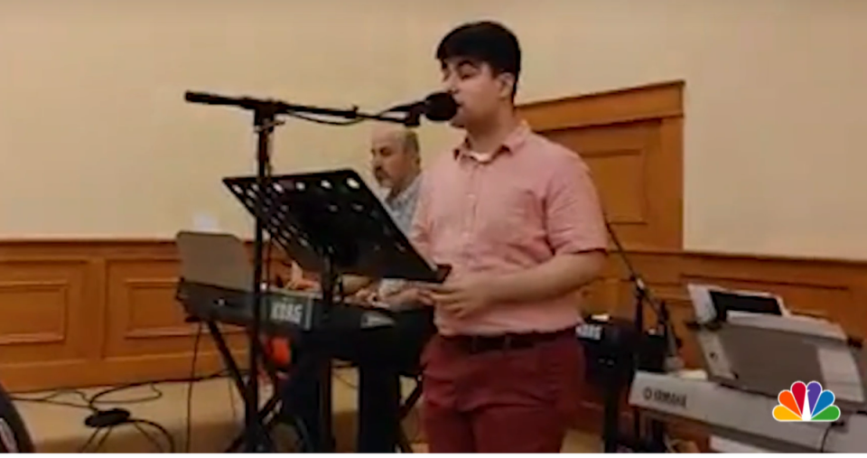 Daniel Moshi, a 17-year-old senior at Leyden High School, collapsed on stage  while performing a choir solo at the All State Honors Show Choir for the Illinois American Choral Directors Association last week (NBC News/video screengrab)