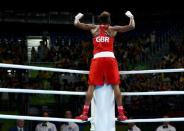 2016 Rio Olympics - Boxing - Final - Women's Fly (51kg) Final Bout 267 - Riocentro - Pavilion 6 - Rio de Janeiro, Brazil - 20/08/2016. Nicola Adams (GBR) of Britain celebrates after winning her bout. REUTERS/Peter Cziborra