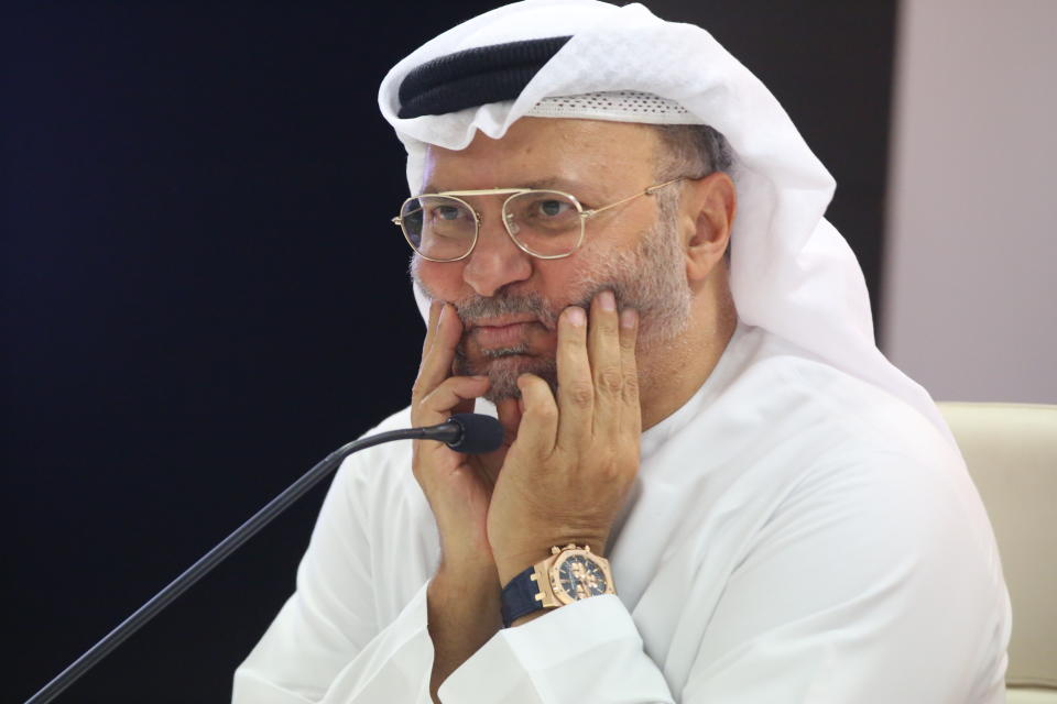 Emirati Minister of State for Foreign Affairs Anwar Gargash attends a news conference on Yemen in Dubai, United Arab Emirates, Monday, Aug. 13, 2018. The United Arab Emirates on Monday described itself as actively fighting al-Qaida's branch in Yemen after an Associated Press report outlined how Emirati forces cut secret deals with the militants to get them to abandon territory. (AP Photo/Jon Gambrell)