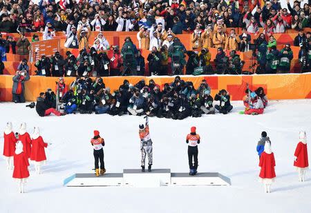 Snowboard - Pyeongchang 2018 Winter Olympics - Women's Parallel Giant Slalom Finals - Phoenix Snow Park - Pyeongchang, South Korea - February 24, 2018 - Silver medallist Selina Joerg of Germany, gold medallist Ester Ledecka of Czech Republic and bronze medallist Ramona Theresia Hofmeister of Germany celebrate. REUTERS/Dylan Martinez