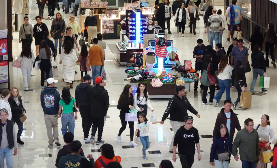 GLENDALE, CALIFORNIA - DECEMBER 26: People shop in the Glendale Galleria shopping mall on the day after Christmas on December 26, 2023 in Glendale, California. U.S. retail sales rose 3.1 percent year over year this holiday season, based on in-store and online purchases, according to Mastercard SpendingPulse. (Photo by Mario Tama/Getty Images)