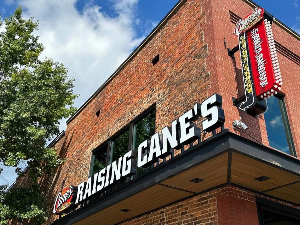 A neon signboard will light the way for “caniacs” looking to get some late-night fried chicken fingers from the new Raising Cane’s location at 101 E. Franklin St. in Chapel Hill.