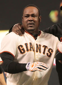 Juan Uribe made a splendid play at short to start the ninth and ended it in the bottom of the frame with a sacrifice fly