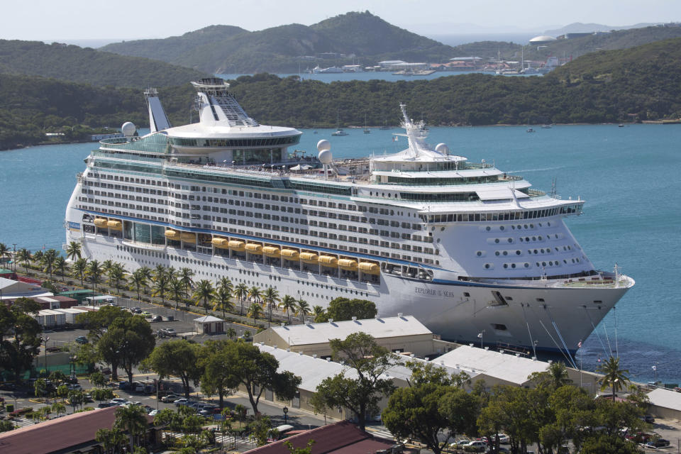 <p> The Royal Caribbean International's Explorer of the Seas is docked at Charlotte Amalie Harbor in St. Thomas, U. S. Virgin Islands, Sunday, Jan. 26, 2014. U.S. health officials have boarded the cruise liner to investigate an illness outbreak that has stricken at least 300 people with gastrointestinal symptoms including vomiting and diarrhea. (AP Photo/Thomas Layer)</p>